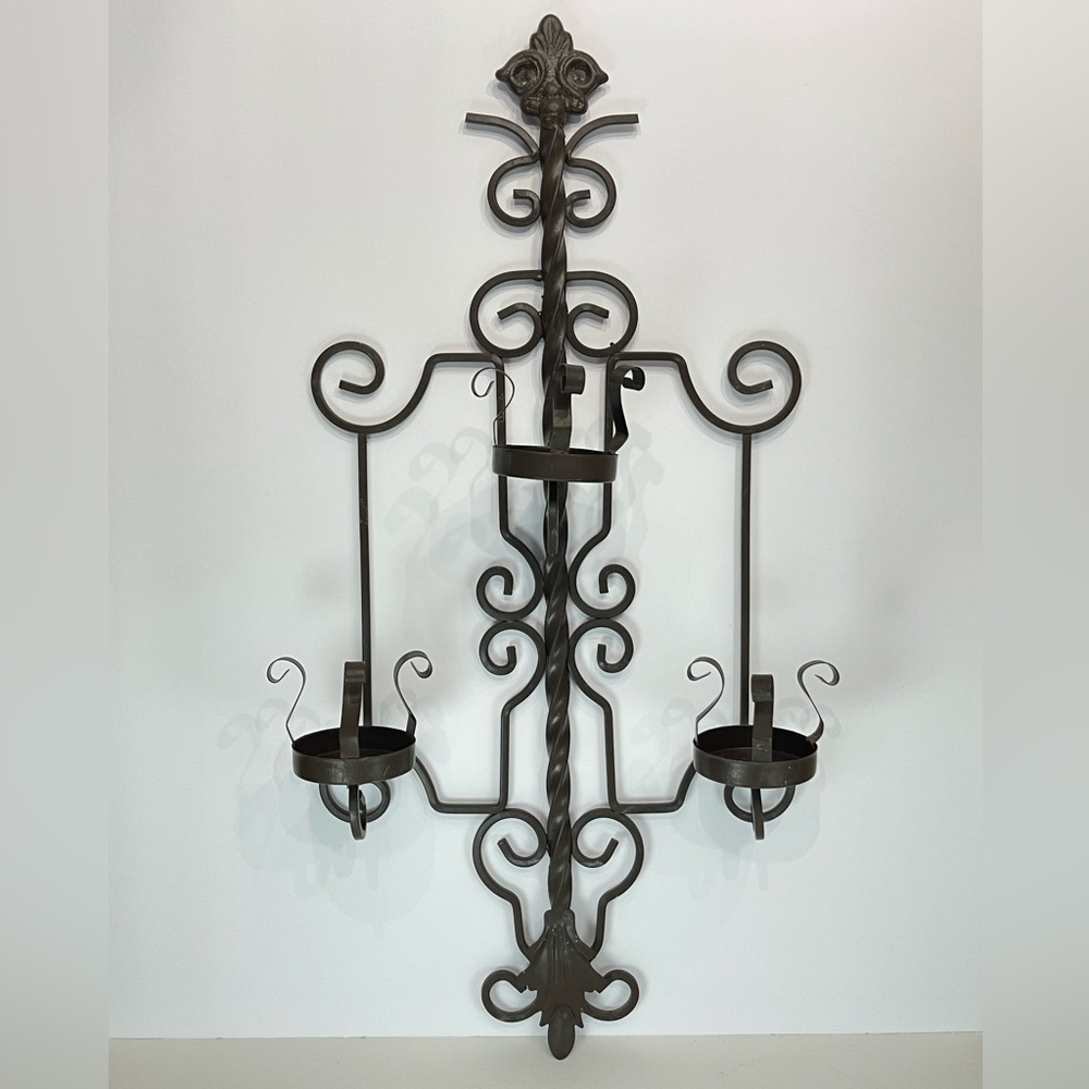 Metal scrollwork wall sconce candle holder